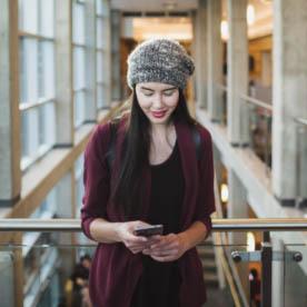 women texting on her phone